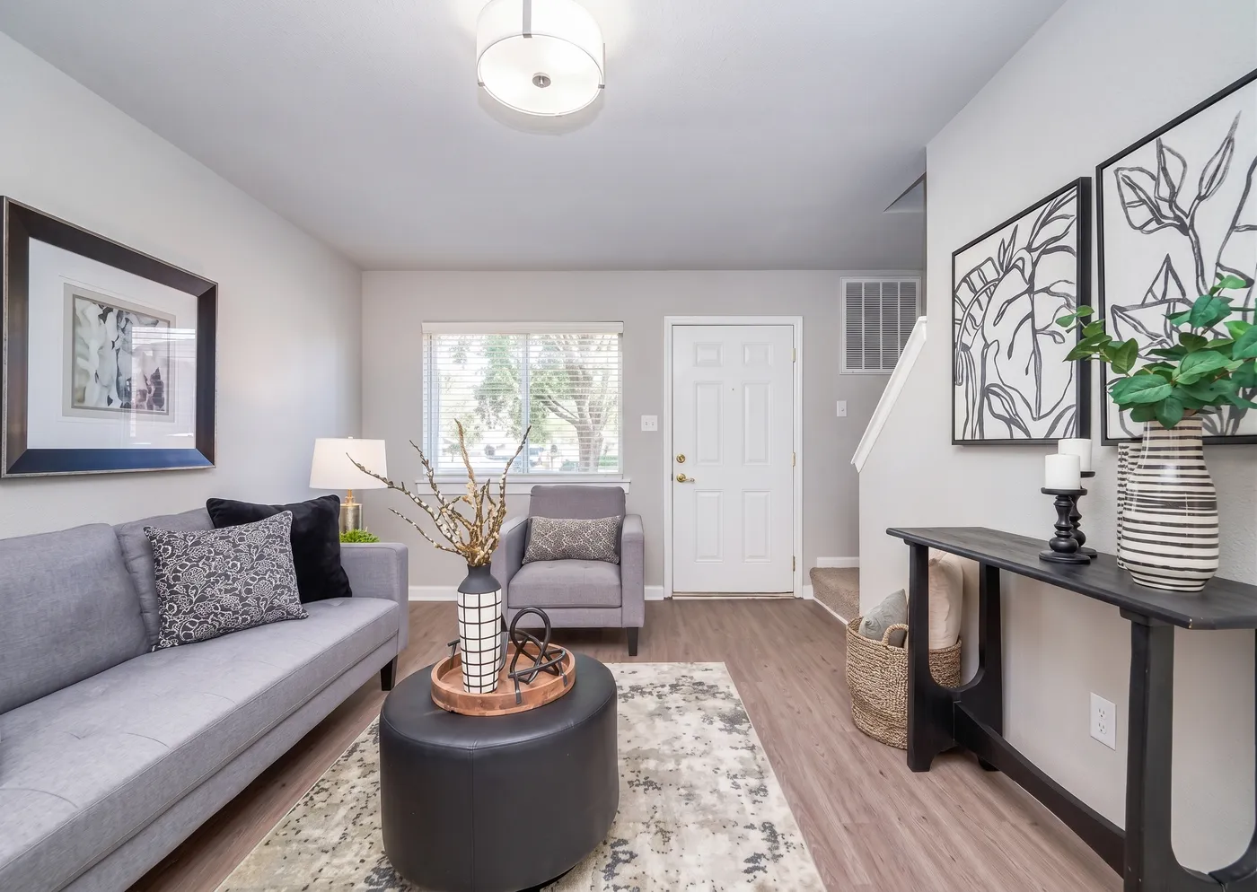 Sunlit townhome living room and dining space at Asbury Place in Hampton VA